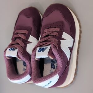 Never worn toddler New Balance sneakers size 7.5